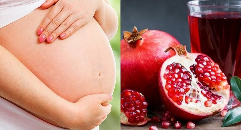 Bầu có nên ăn lựu không: Một phụ nữ mang thai đang cầm quả lựu tươi ngon, thể hiện sự thắc mắc về việc ăn lựu trong thai kỳ.