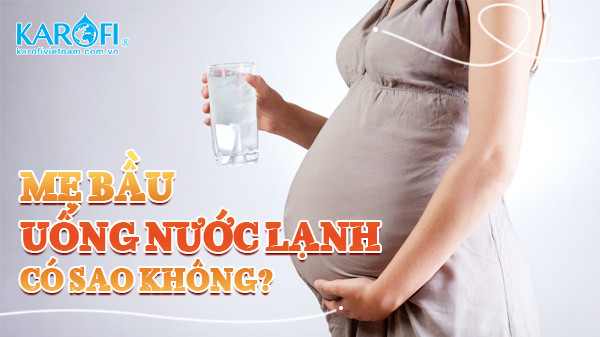 Bà bầu uống nước lạnh có sao không, hình ảnh mẹ bầu với ly nước lạnh