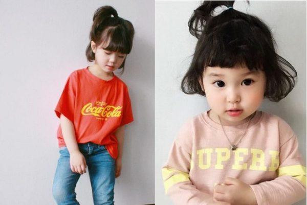 Bé gái tóc xoăn Hàn Quốc buộc nửa đầu tinh nghịch