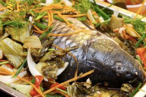 Cá chép om dưa chua mặn hấp dẫn, dễ ăn cho bà bầu