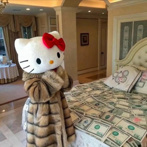 Hình ảnh Hello Kitty dễ thương tạo dáng đáng yêu, là lựa chọn tuyệt vời cho fan hâm mộ.