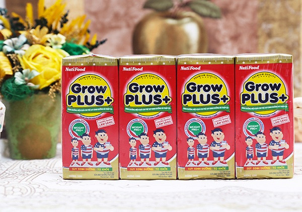 Hộp sữa Grow Plus+ Nutifood màu đỏ