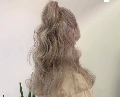 Hướng dẫn buộc tóc nửa đầu cao uốn xoăn cho tóc dài