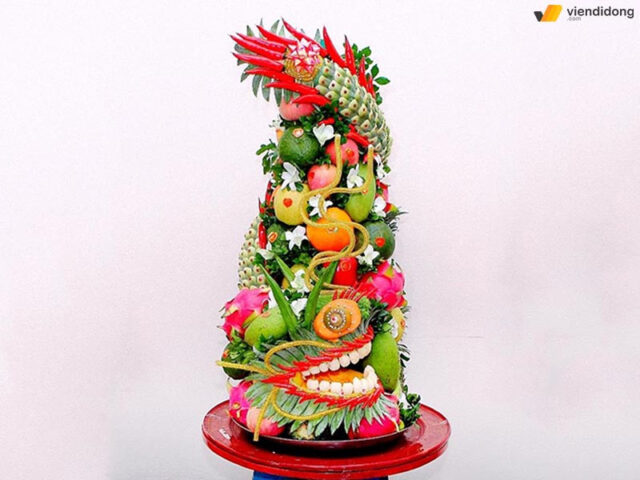 Mâm ngũ quả ngày Tết đẹp theo hình tượng Long Phụng sum vầy, biểu tượng của sự may mắn và hạnh phúc lứa đôi