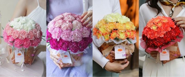 Rổ hoa cẩm chướng hồng và trắng cắm tròn đầy, mang vẻ đẹp mộc mạc và chân thành, là món quà lý tưởng để mừng ngày Phụ Nữ Việt Nam 20/10.