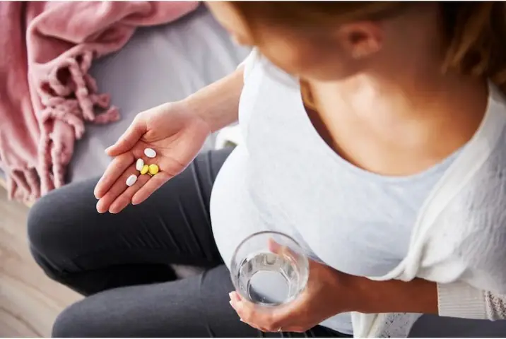 1Nguyên nhân khiến mẹ bầu bị đau đầu